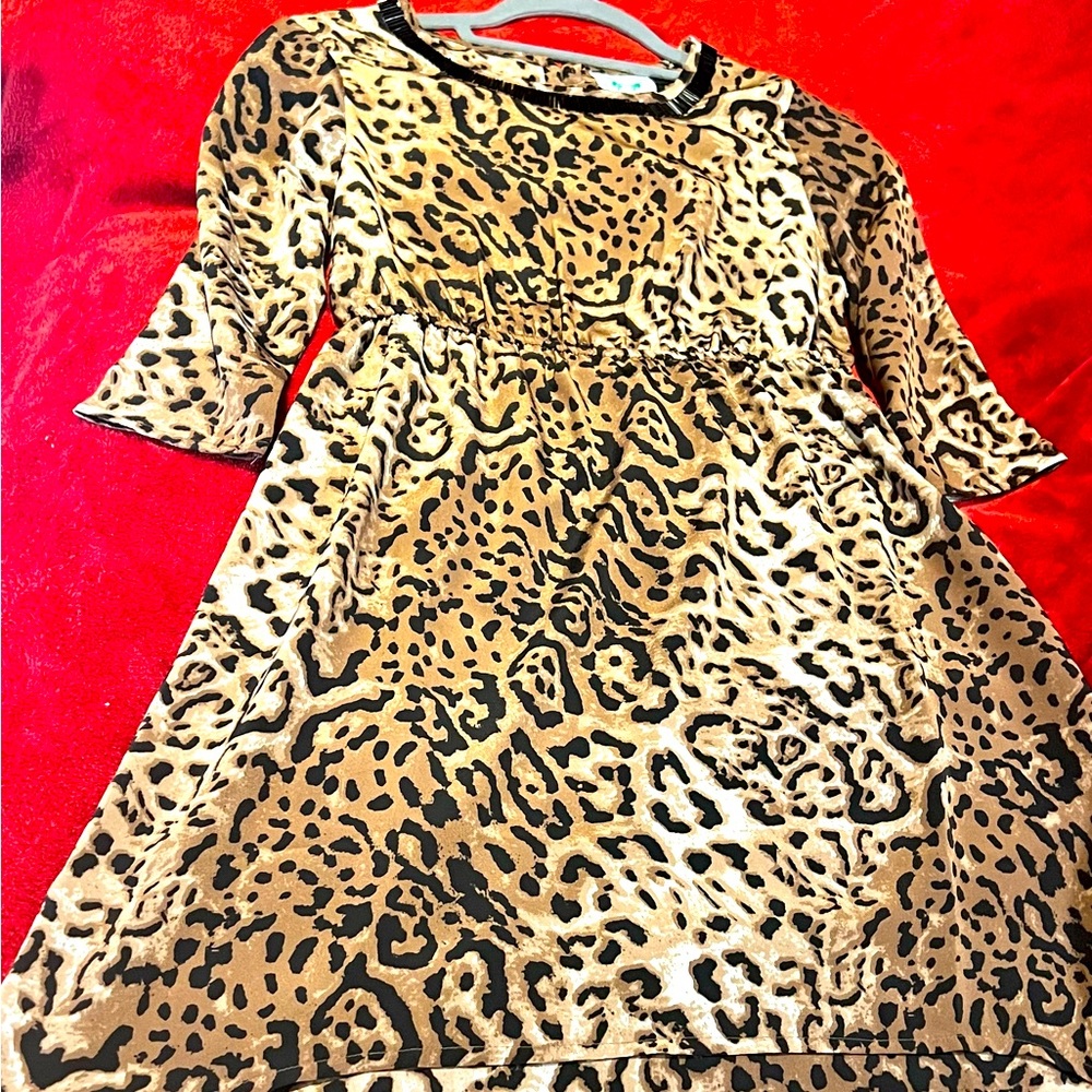 Animal print long sleeve dress in 14 with beading in neckline.